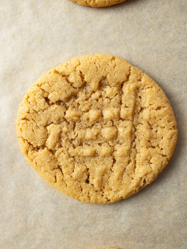 Peanut butter cookie on a parchment paper.