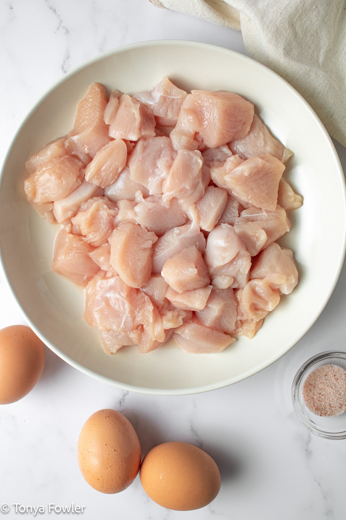 Chicken nuggets ingredients on plate. 