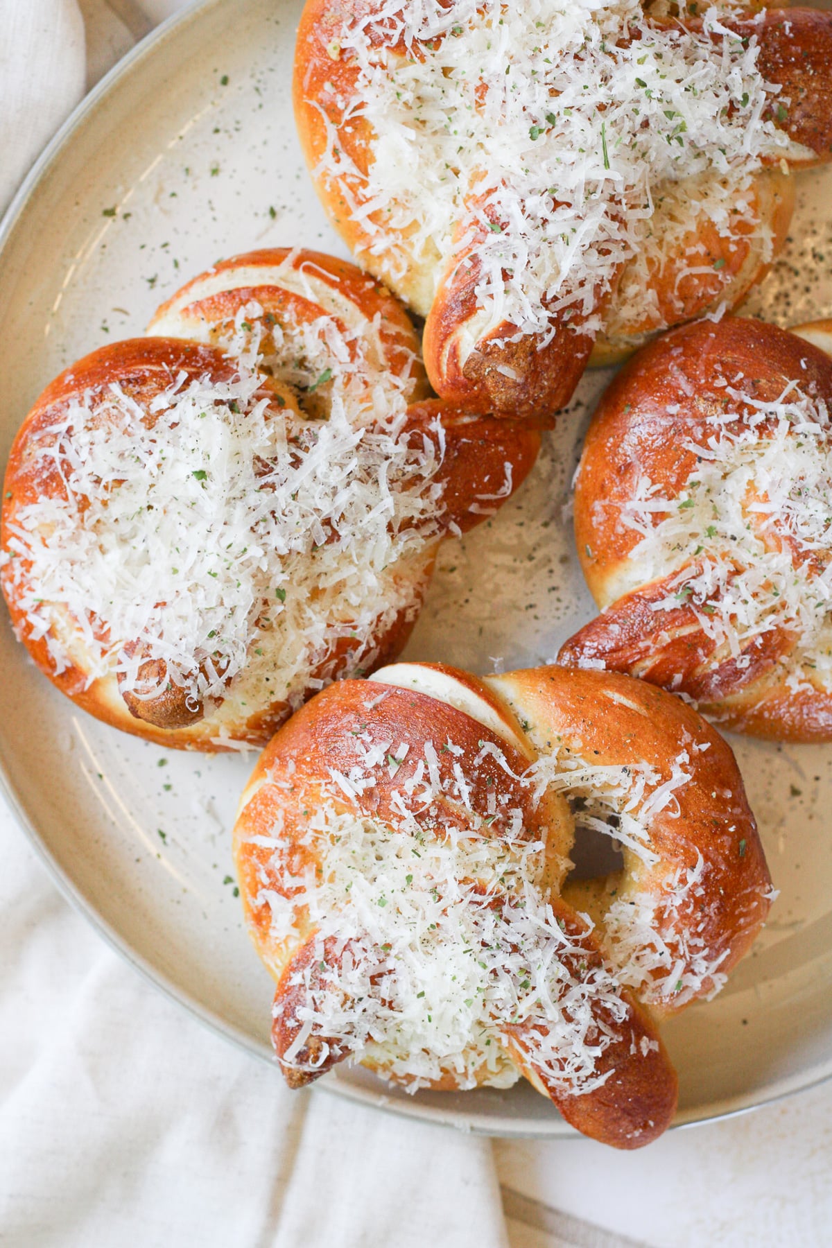 Parmesan pretzels on a plate.