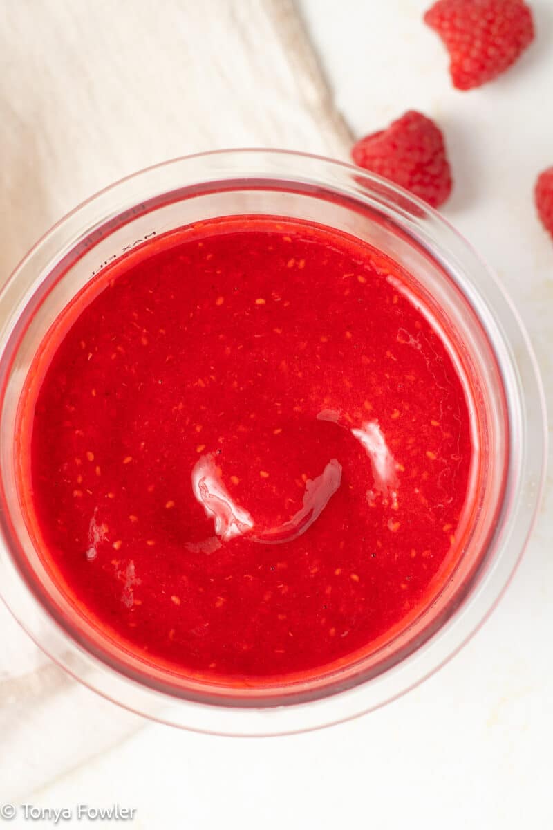 Blended raspberry puree in a bowl.
