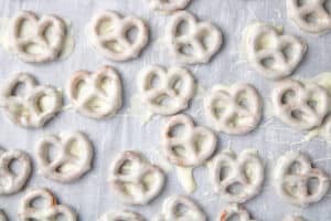 Chocolate covered pretzels on a sheet pan.