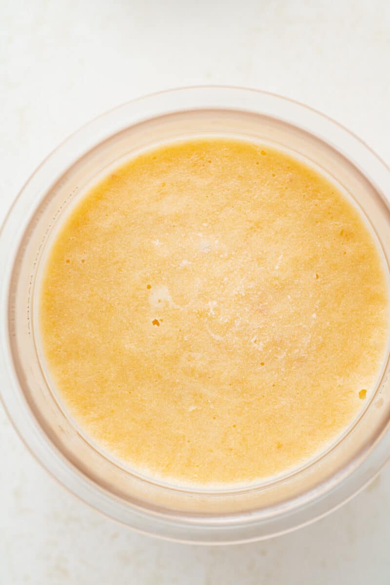 Frozen ice cream base in a container.