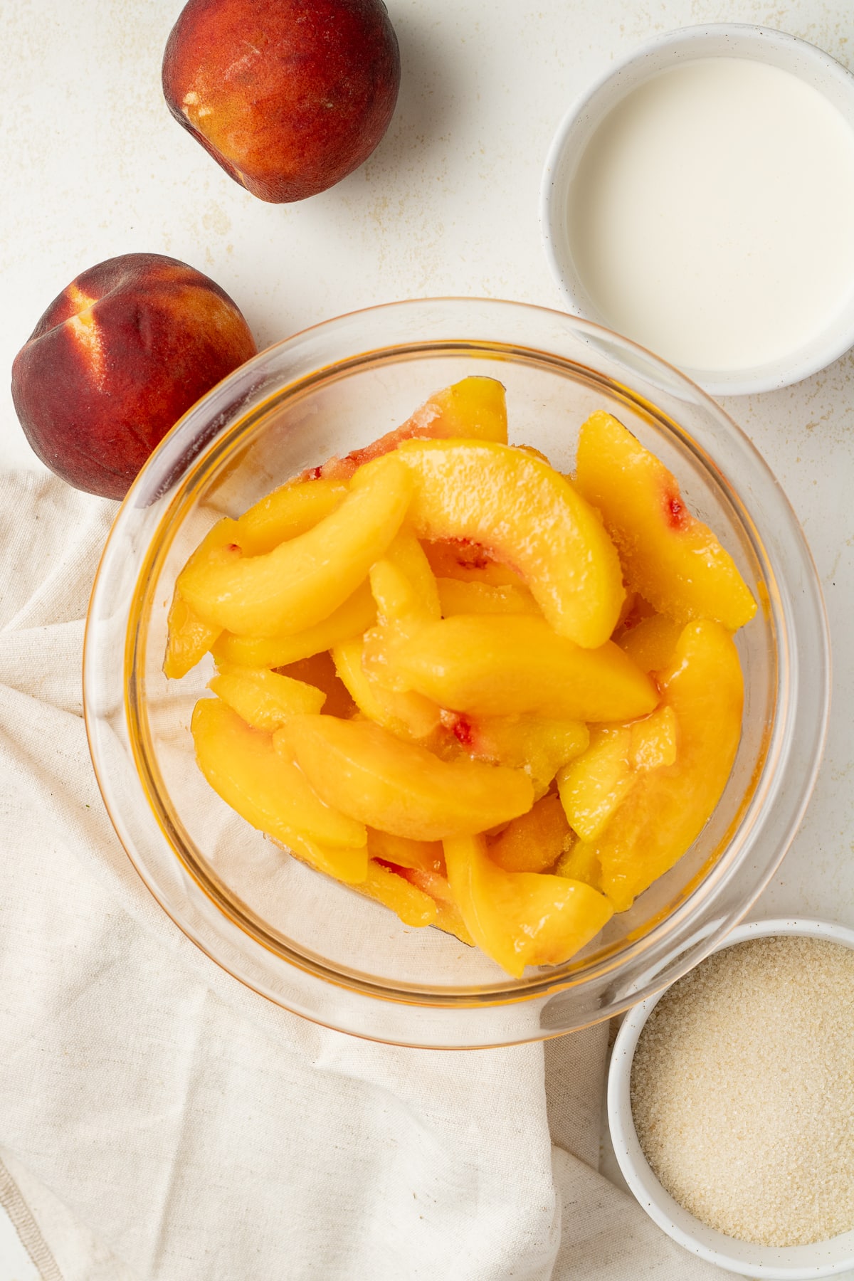 Peach ice cream ingredients on a table. 