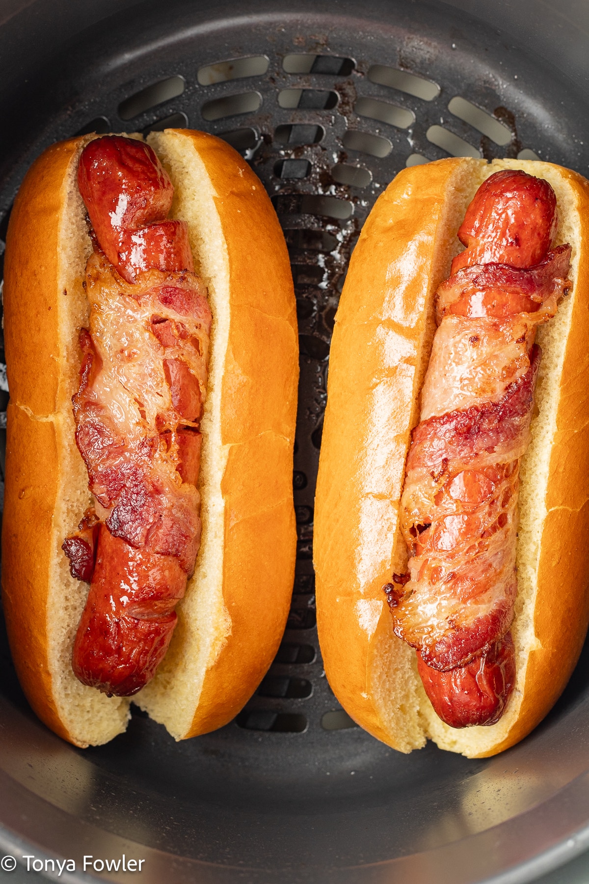 Air fryer bacon wrapped hot dogs.