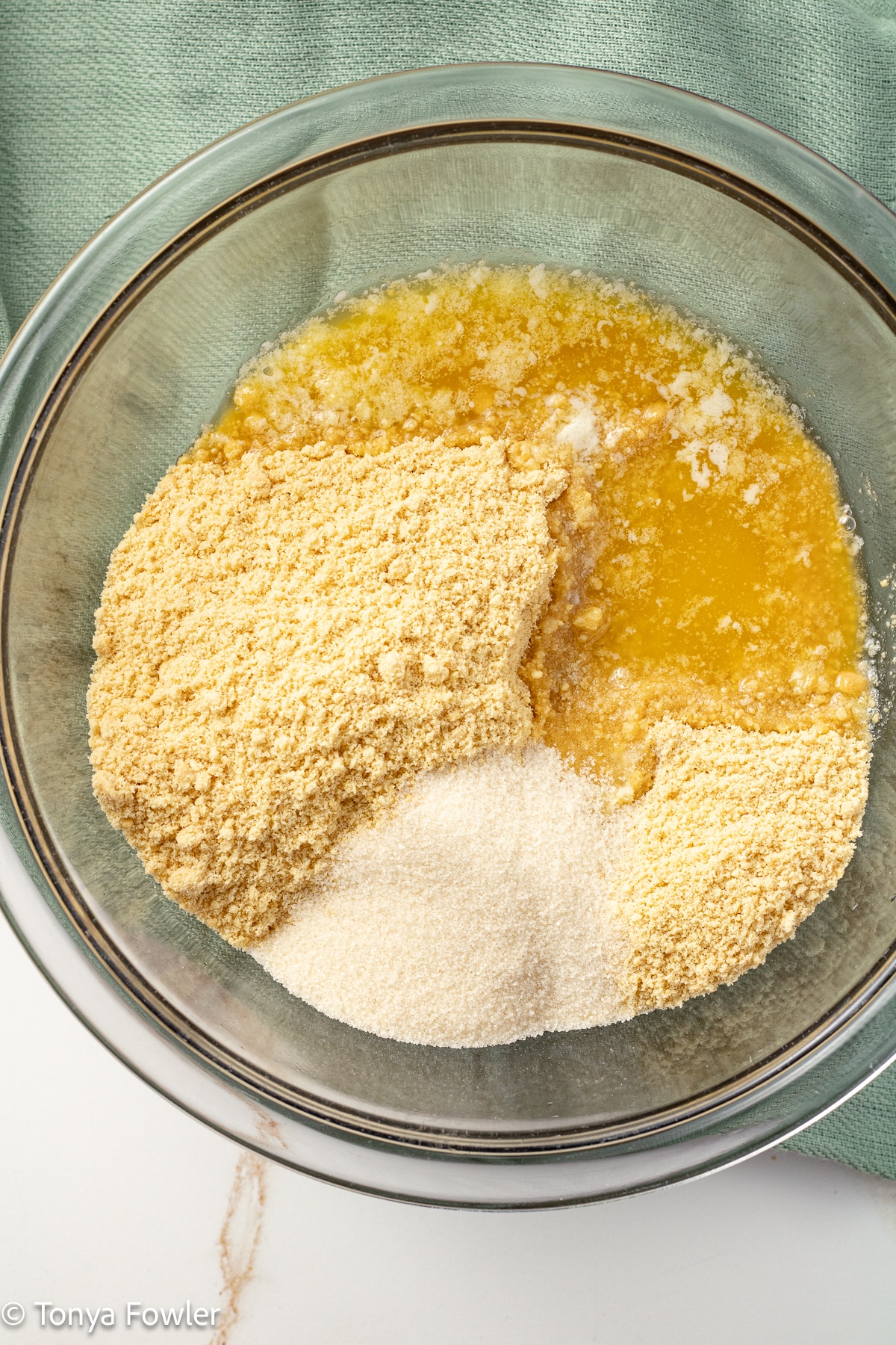 Graham cracker crust ingredients in a bowl. 