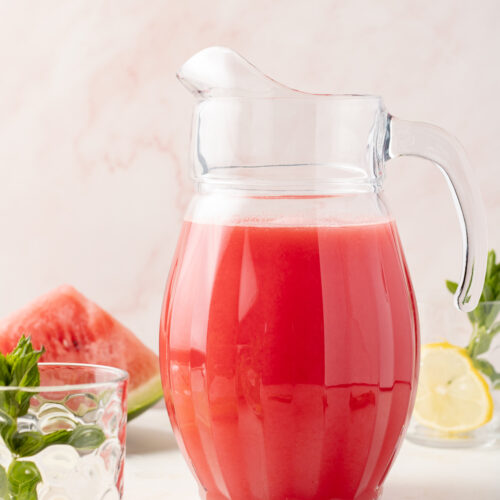 Watermelon mint lemonade in a pitcher.