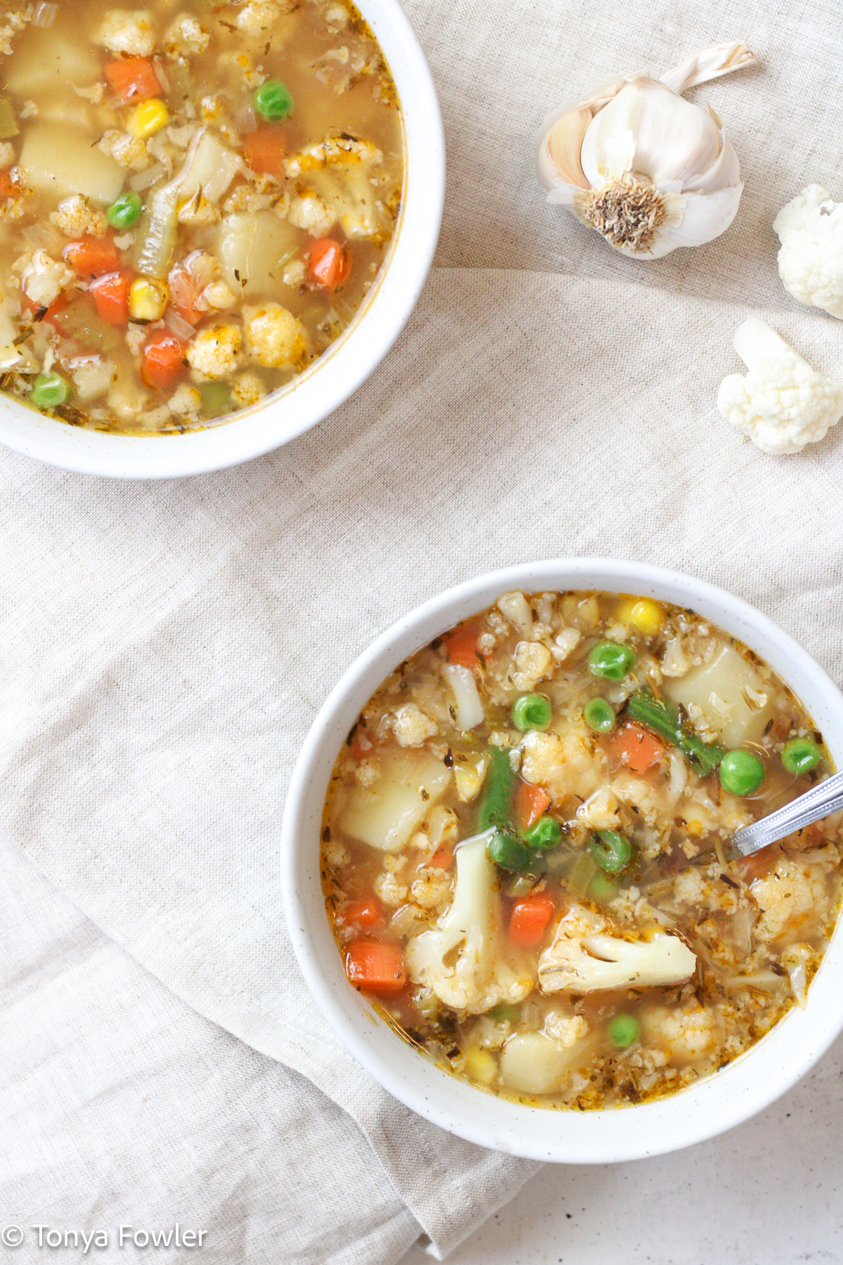 Bowls of soup on a table.