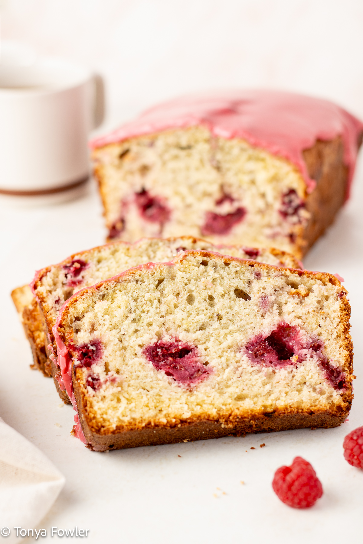 Slice of pound cake on a counter.