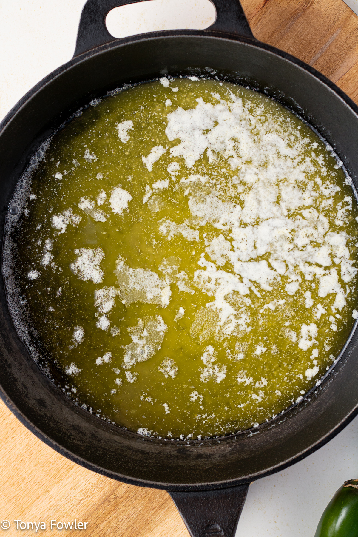 Melted butter in a skillet. 