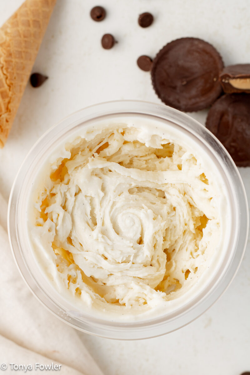 Overhead view of blended ice cream in a pint container.