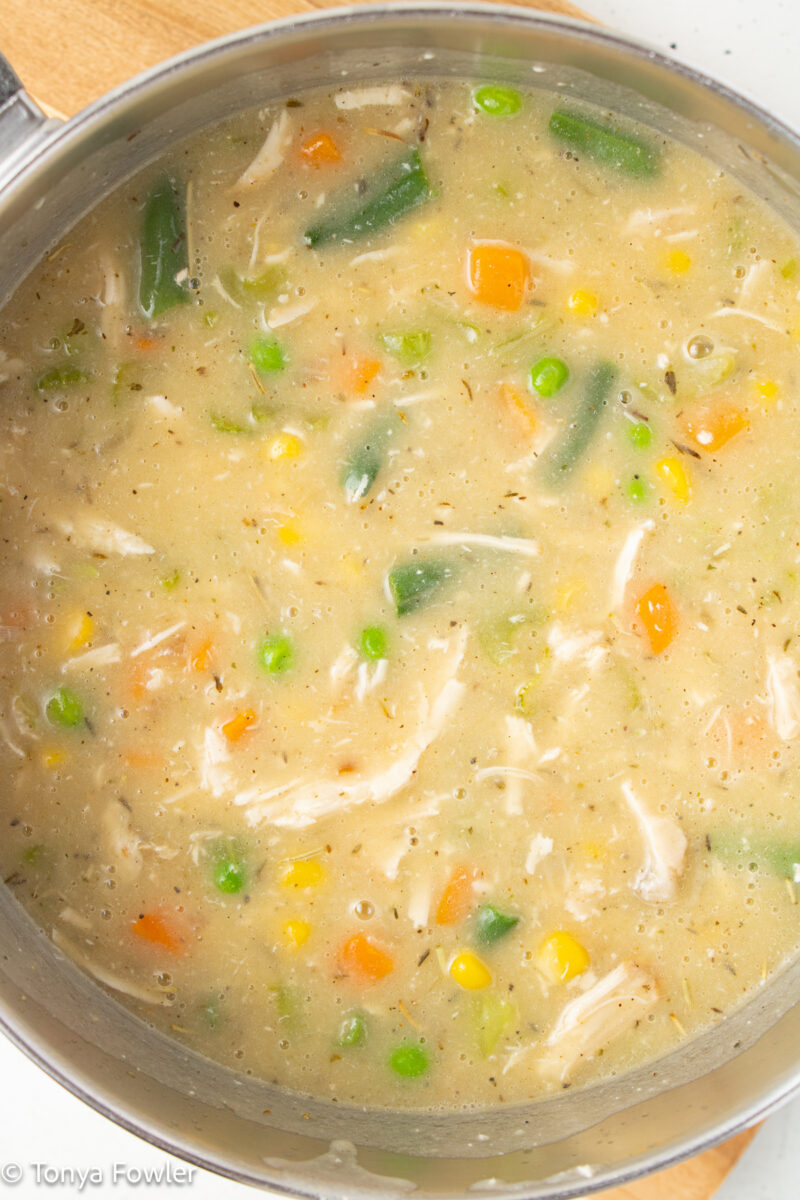 Turkey pot pie filling in a pot.