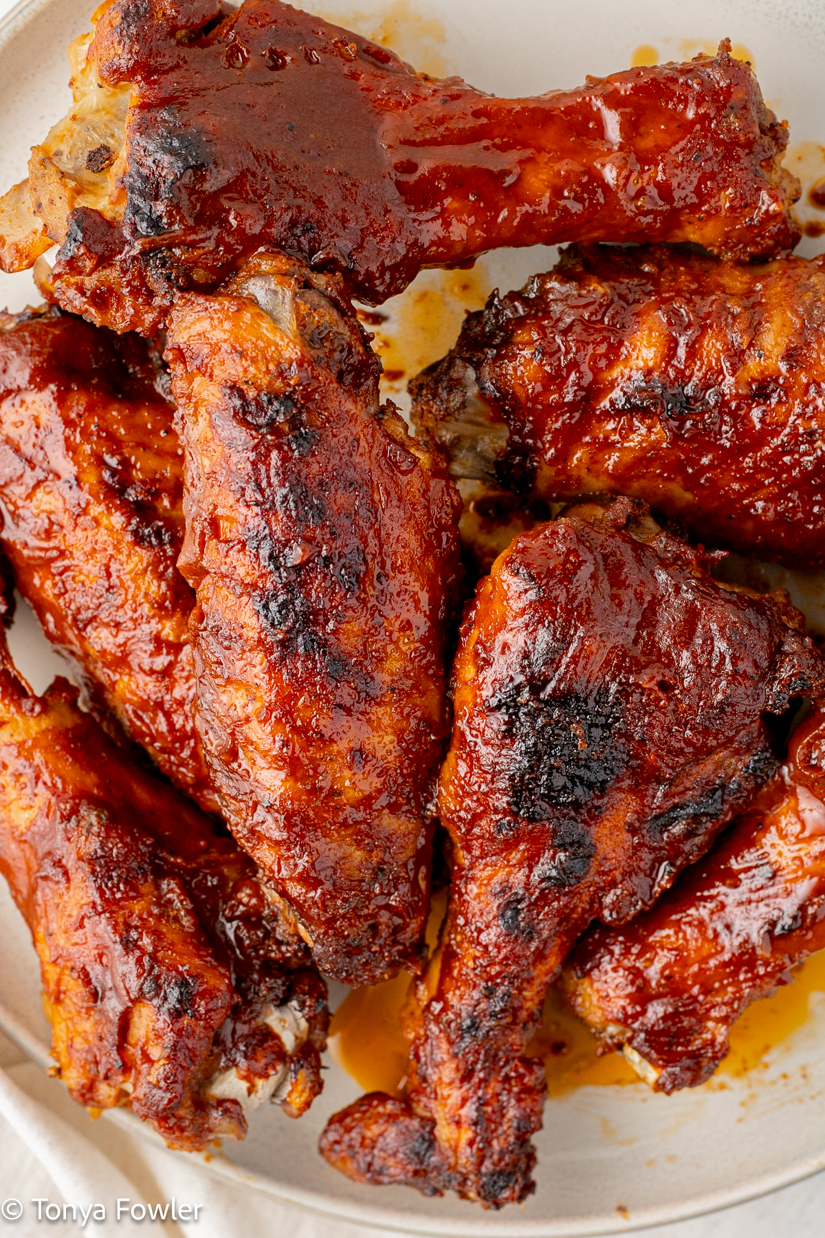 Close up image of BBQ Turkey Wings on a plate.