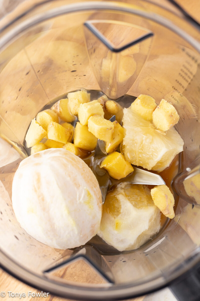 Lemon and ginger in a blender.