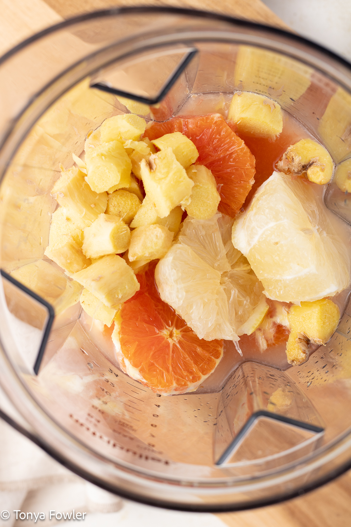 Fruit and ginger in a blender. 