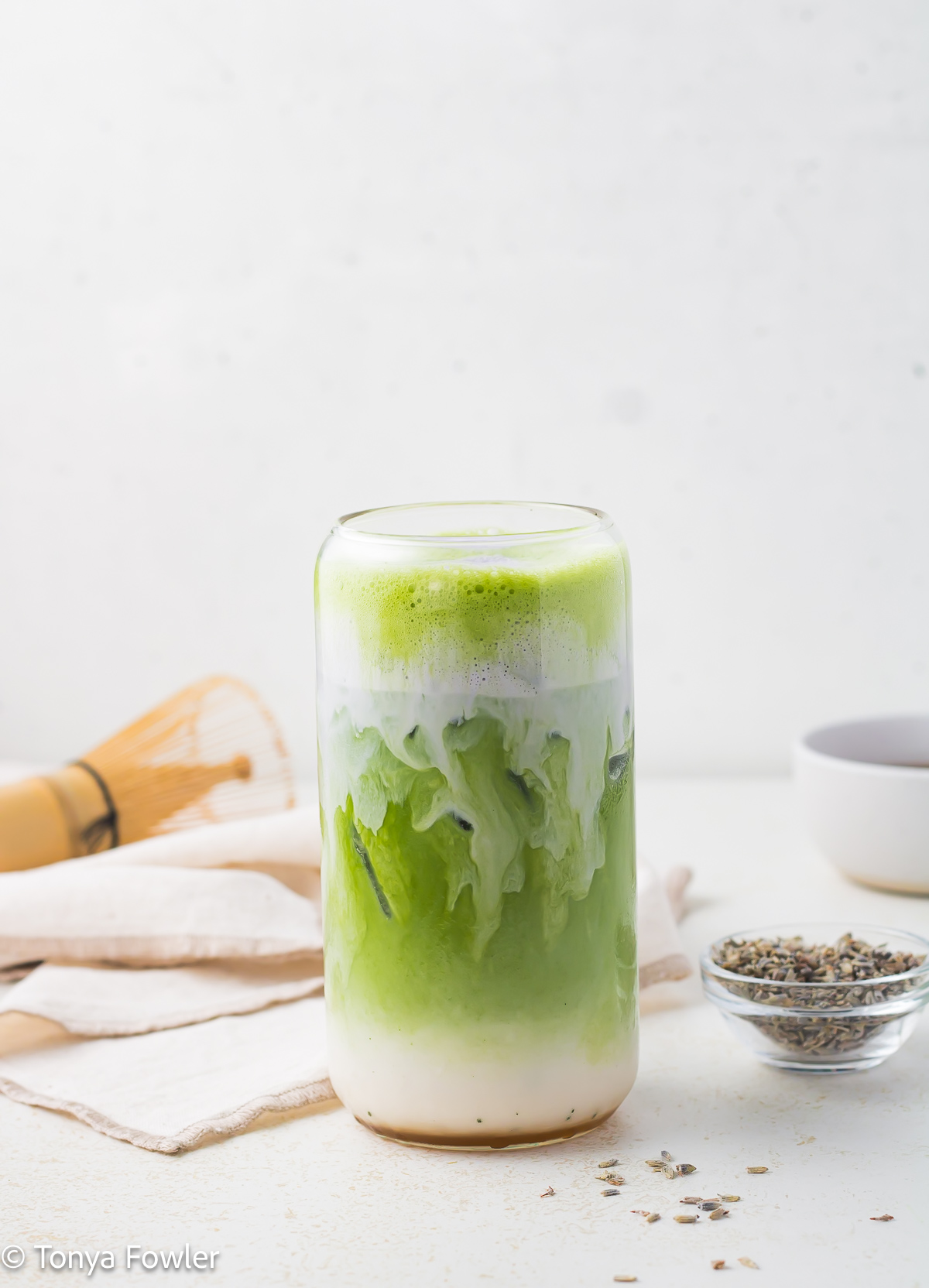 Side view of a lavender matcha latte.