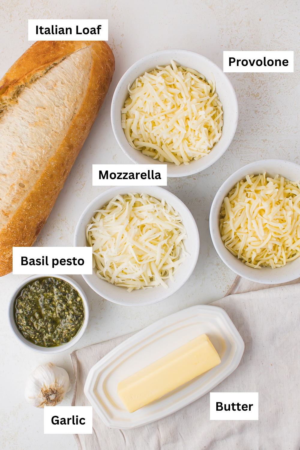 Cheesy pesto bread ingredients infographic.