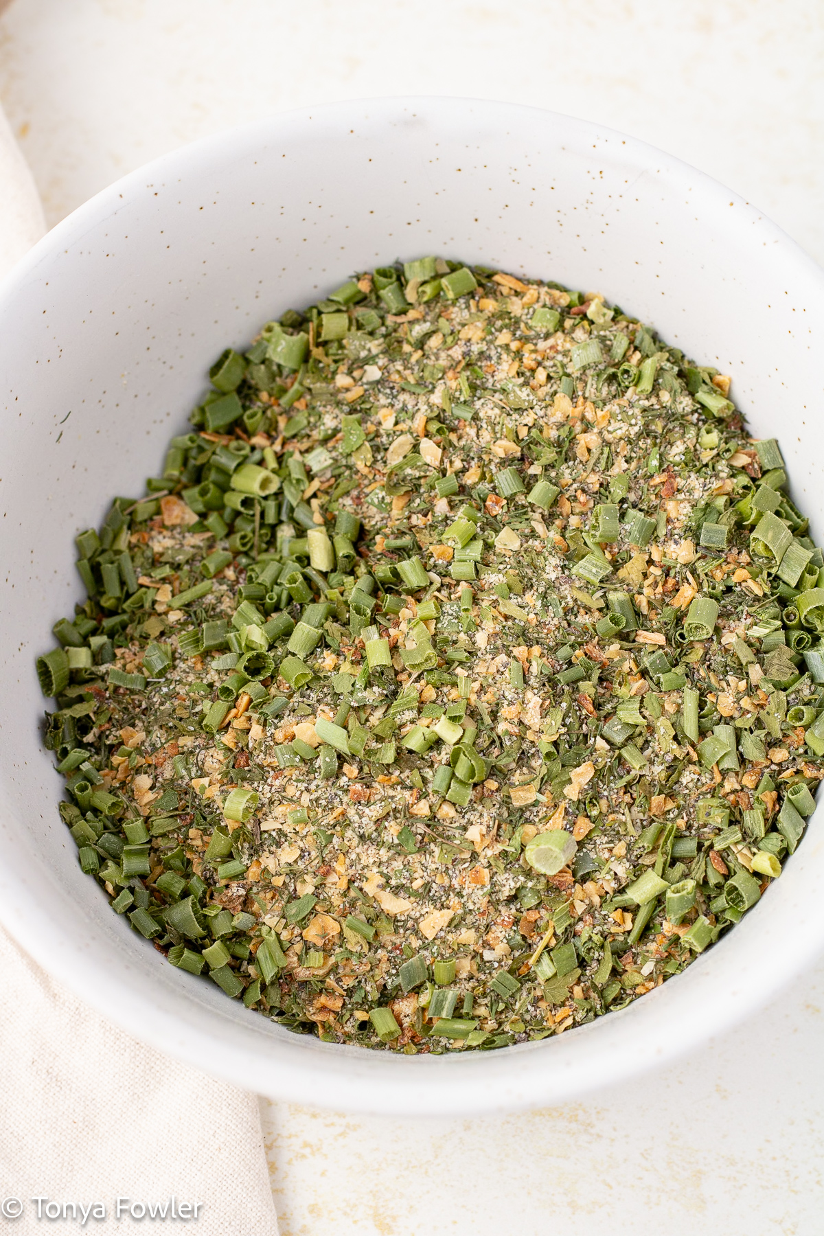Close up image of seasonings mixed up in a bowl.