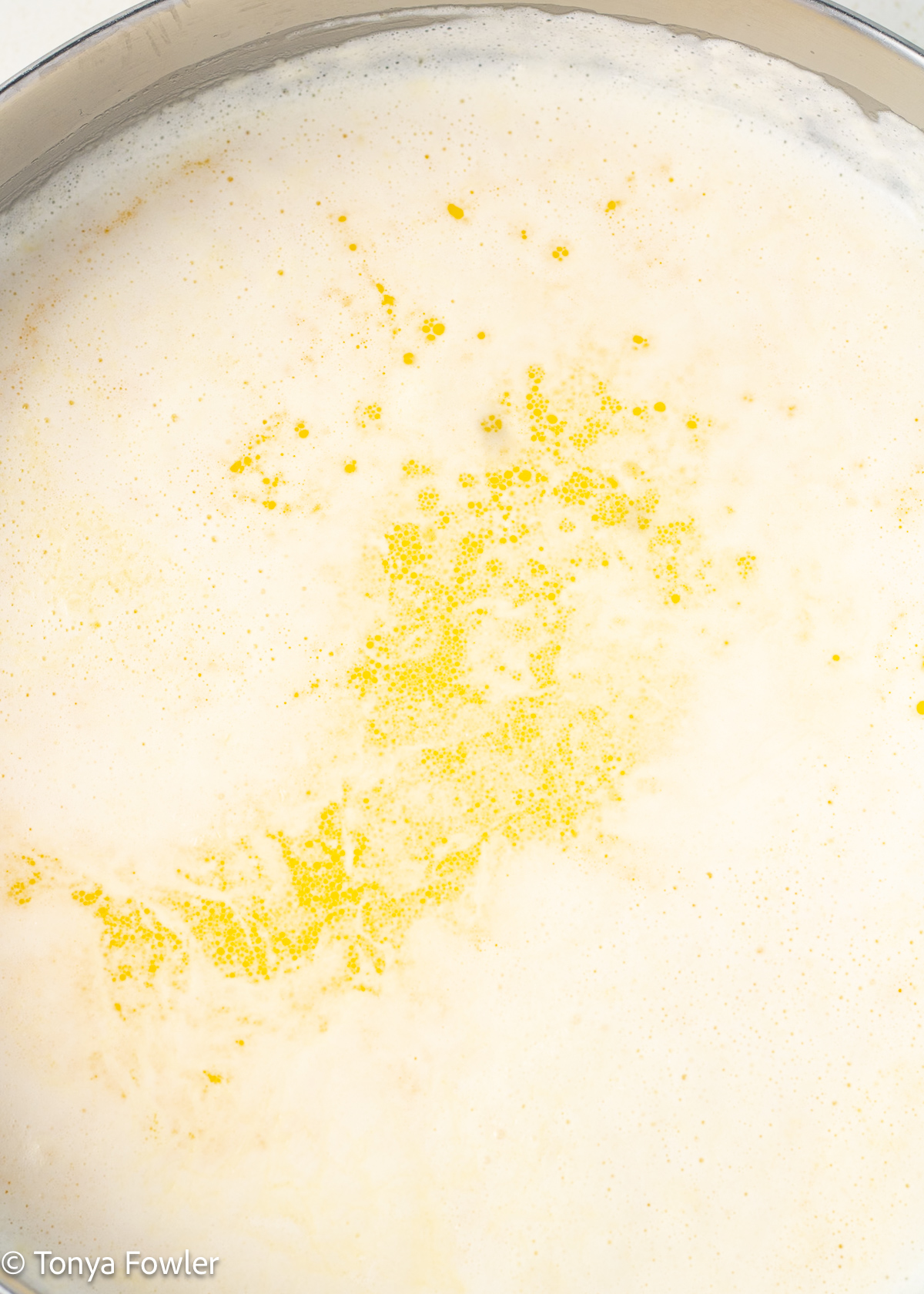 Butter and cream in a skillet.
