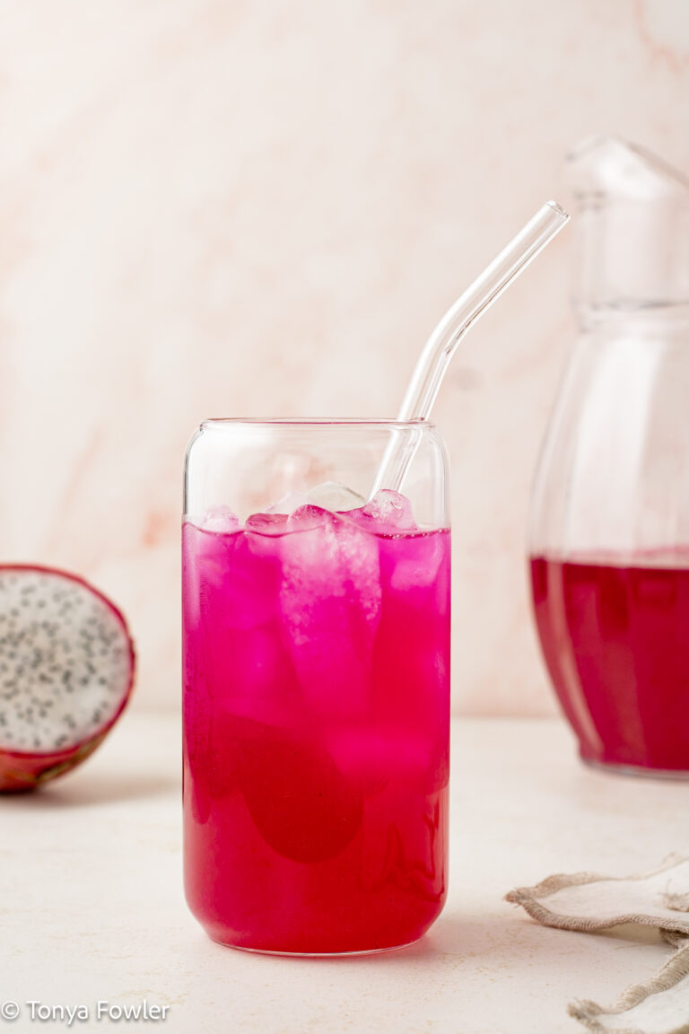 Lemonade in a glass with ice.