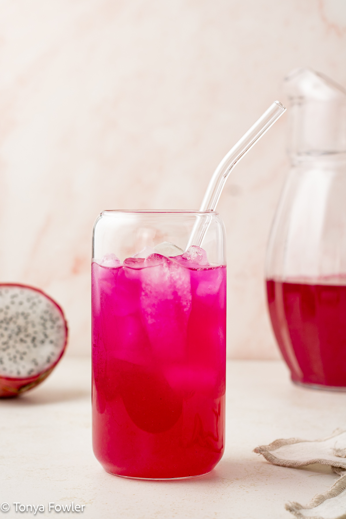 Lemonade in a glass with ice.