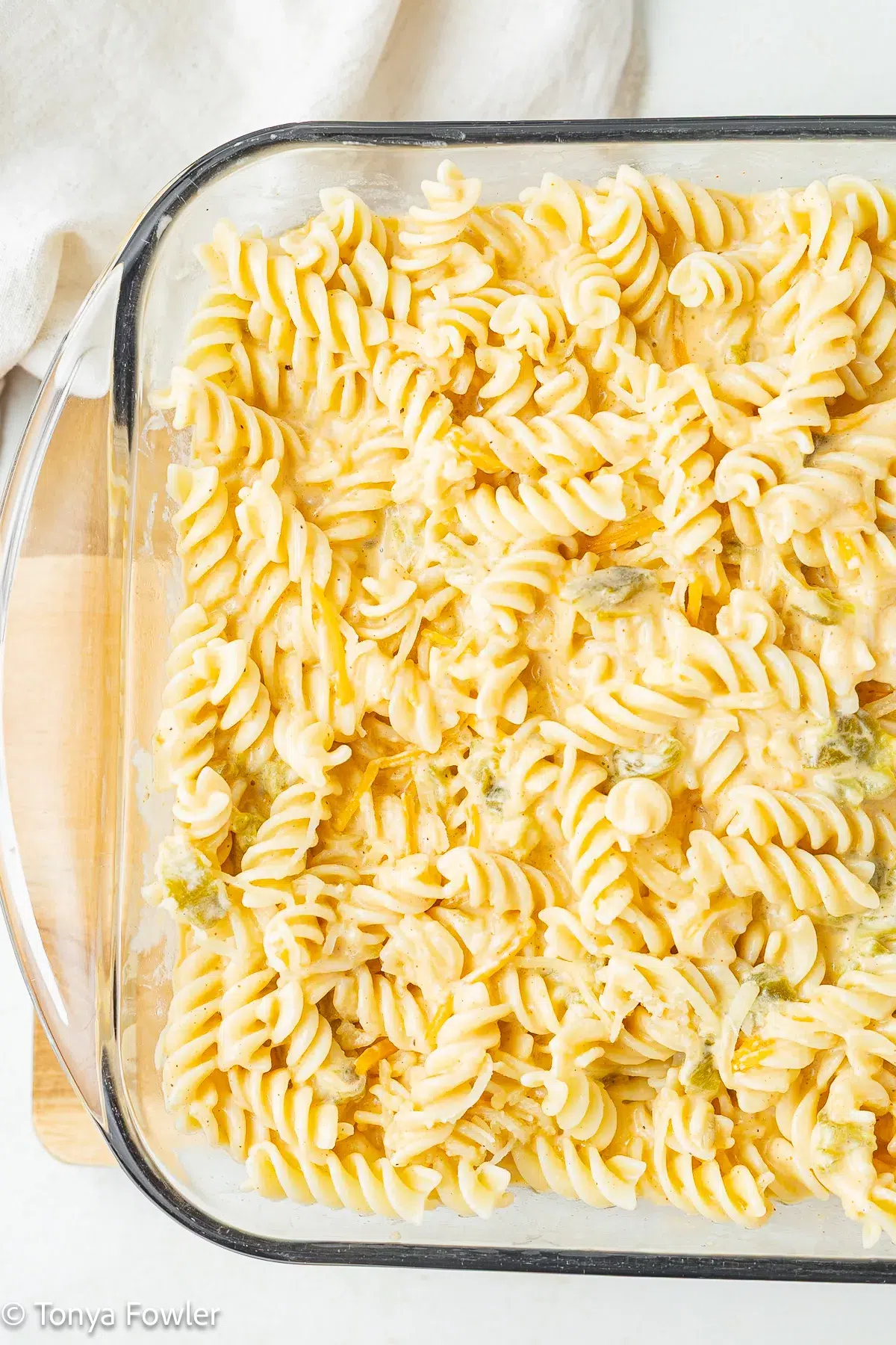 Unbaked mac and cheese in a baking dish.