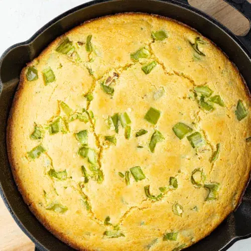 Overhead image of a pan of hatch chile cornbread.
