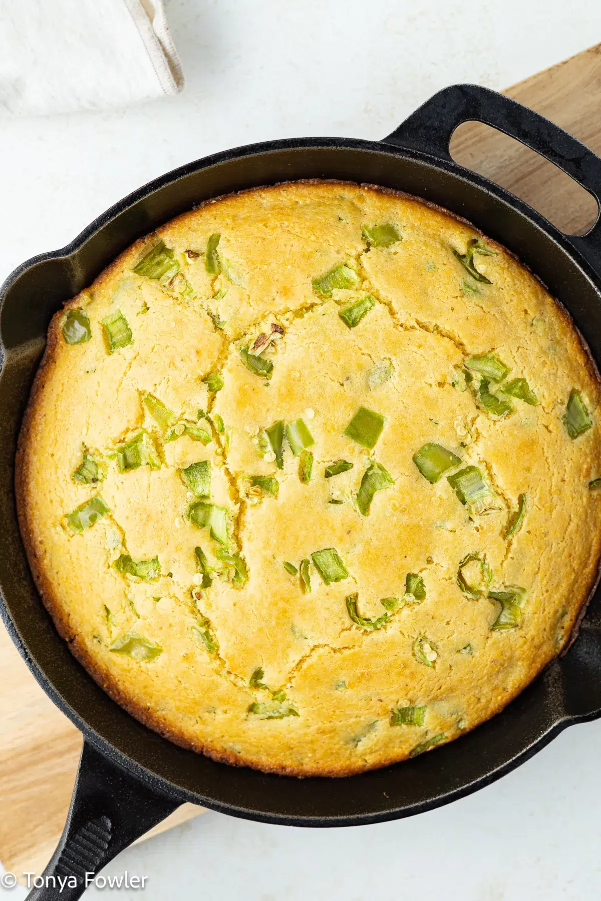 Overhead image of a pan of hatch chile cornbread.