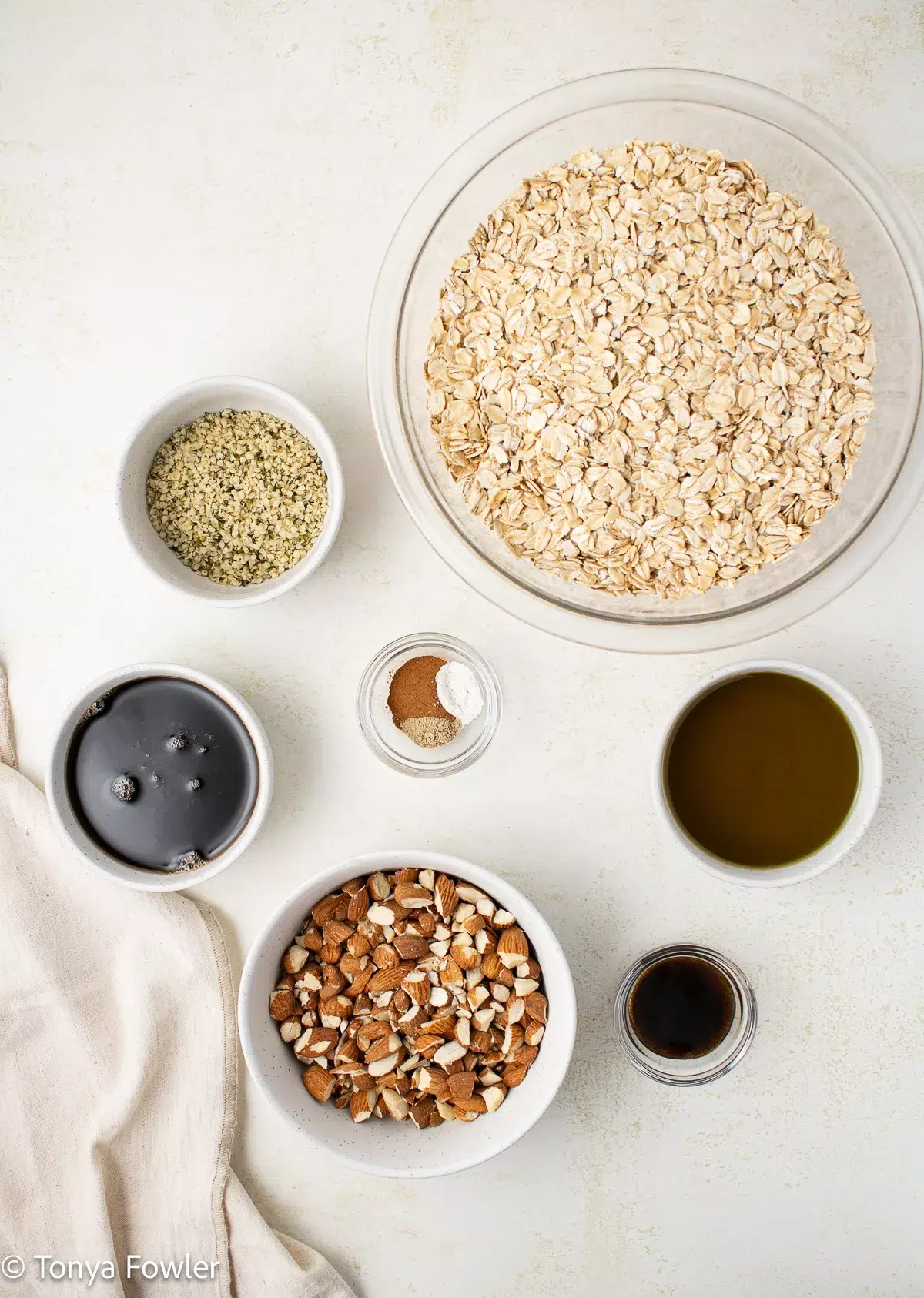 Overhead image of granola ingredients on a table.