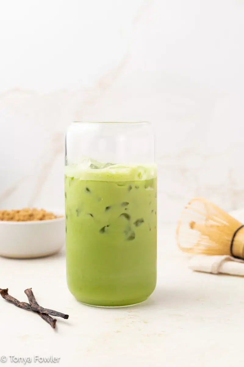 Matcha latte in a cup with ice.