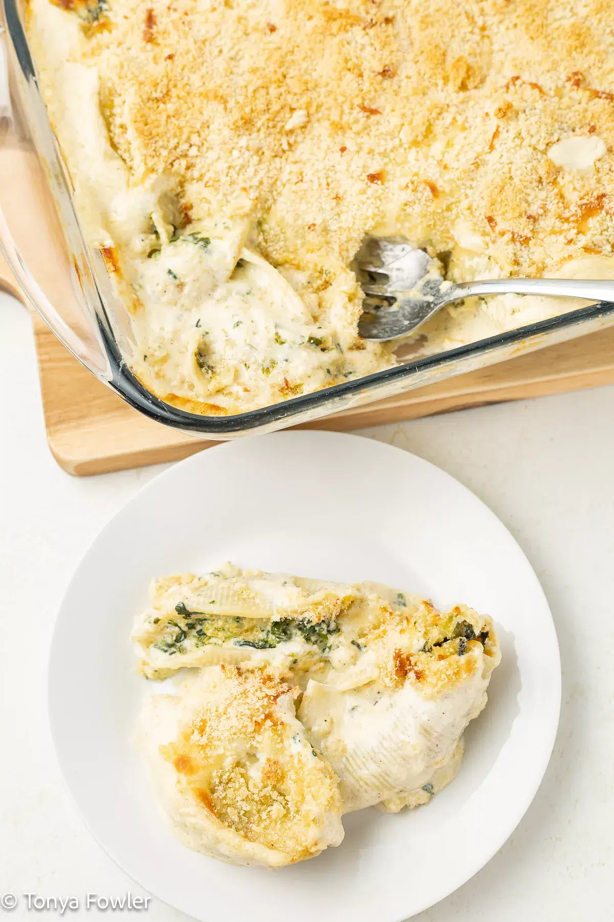 Stuffed shells on a plate.