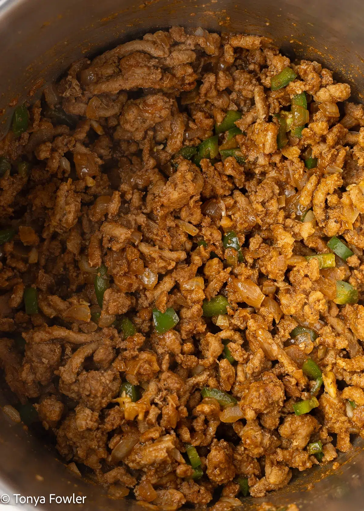 Cooked ground turkey in a pot.
