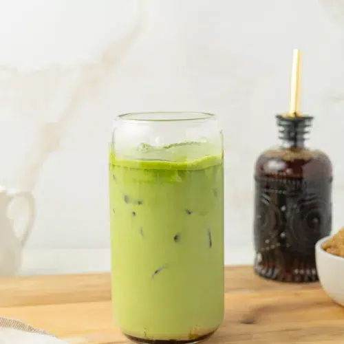 Brown butter matcha latte in a glass.