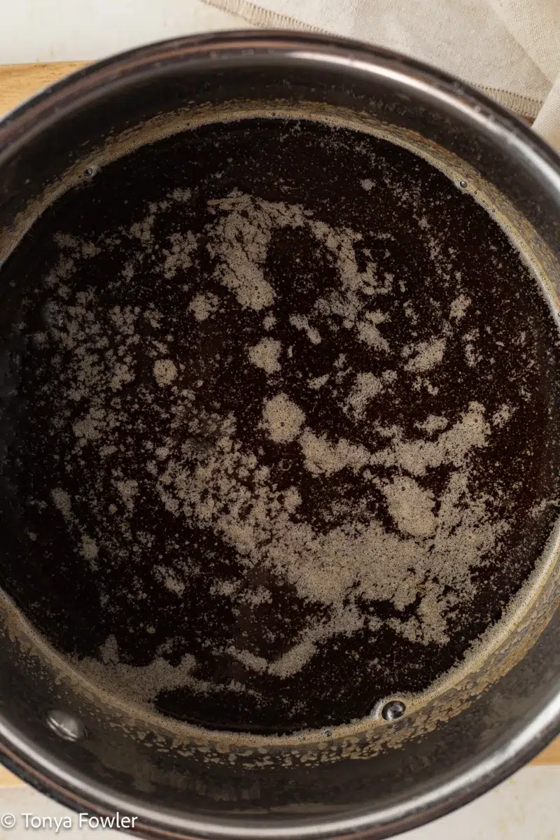 Brown butter brown sugar syrup in a pot.