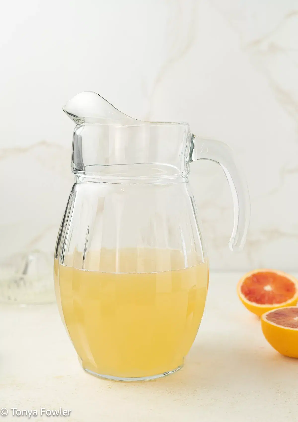 Lemonade in a pitcher.
