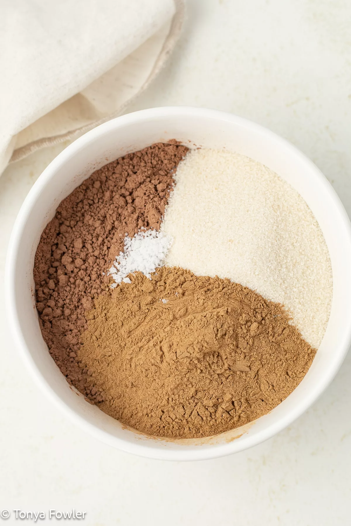 Hot chocolate ingredients in a bowl.