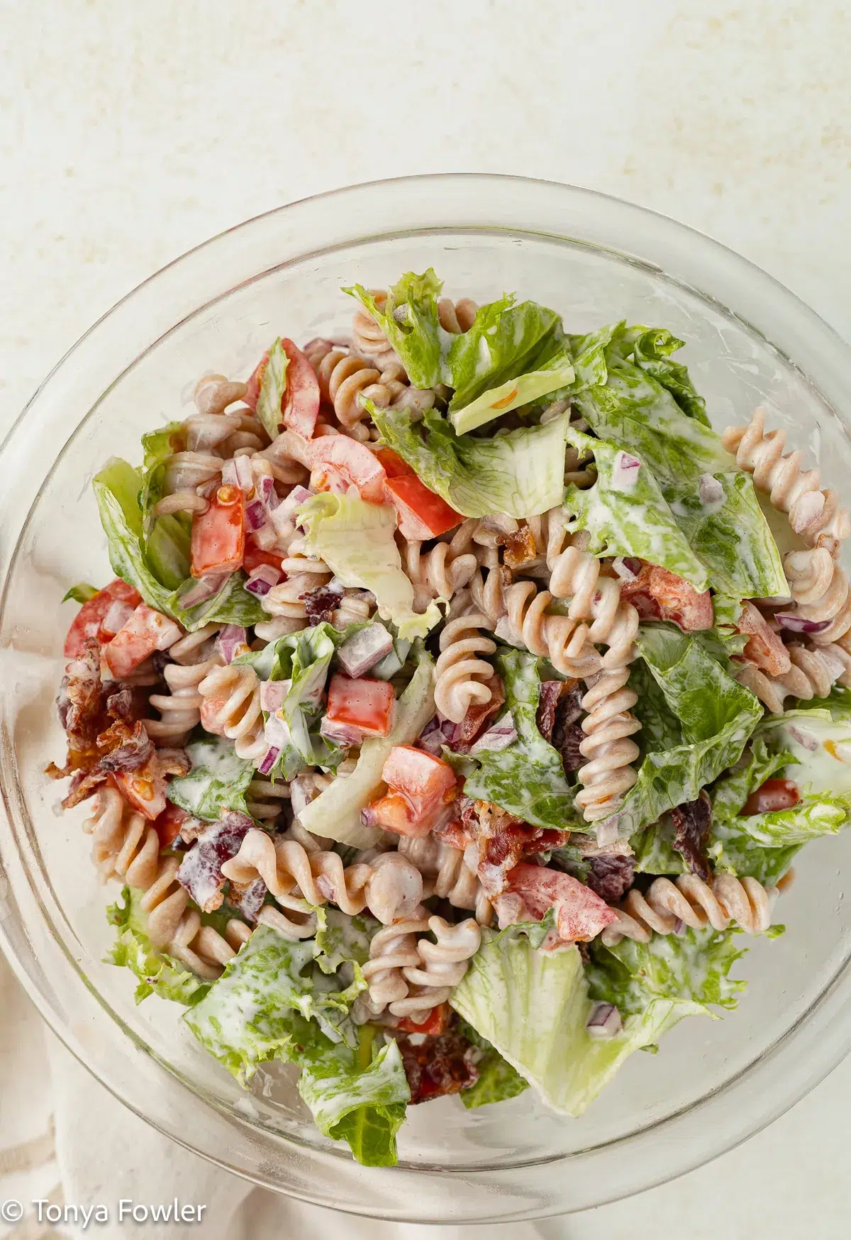 Overhead view of pasta salad in a bowl.