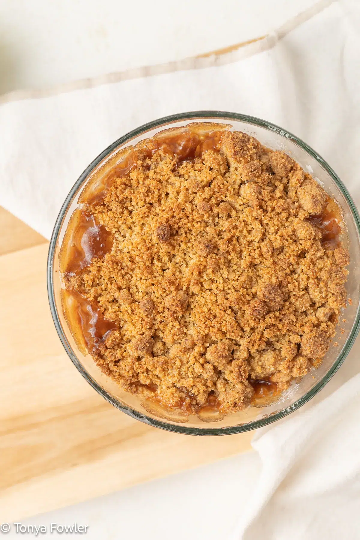 Baked apple crumble in a baking dish.