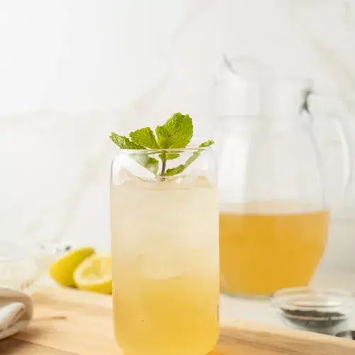 Iced tea lemonade in a glass with mint.