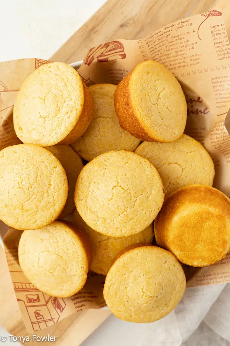 Overhead view of a basket of cornbread.